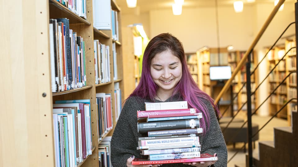 Student med böcker