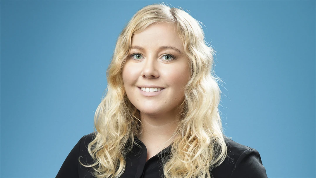 Porträtt av en kvinna.